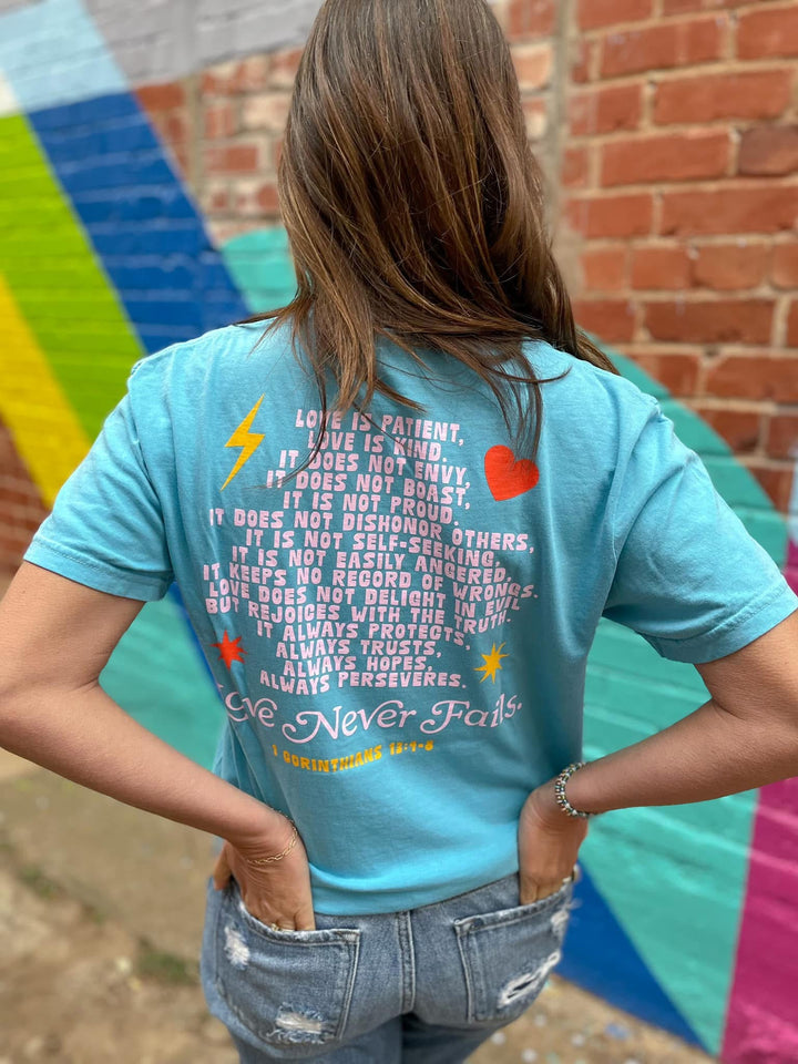 Love Never Fails Comfort Colors Tee